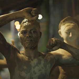 Photo A Doll Made Up Of Clay