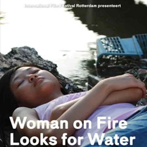 Photo Woman on Fire Looks for Water