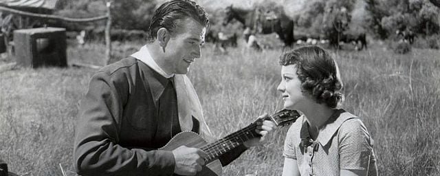 John Wayne et Sheila Bromley dans “Westward Ho”