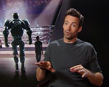 La scène de danse en duo de "Que le spectacle commence" par Hugh Jackman...